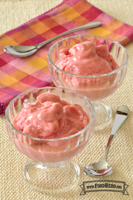 Footed dessert glasses with a creamy pink blend.