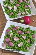 Plates of a vibrant pea and radish mix.