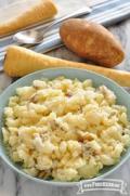 Bowl of seasoned and mashed parsnip and potato.