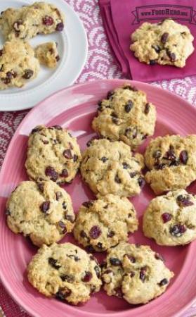 Plate of golden whole-wheat scones with raisins.