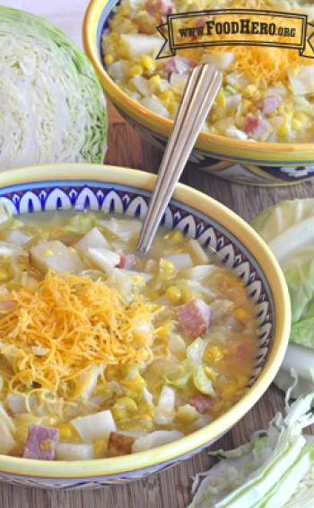 Small bowls of potato and ham soup with shredded cheese.