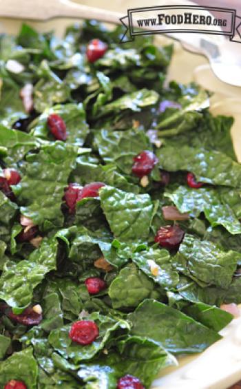 Plate of stir-fried kale with cranberries.